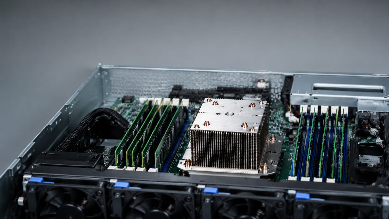 Server hardware components including RAM modules and cooling system inside chassis