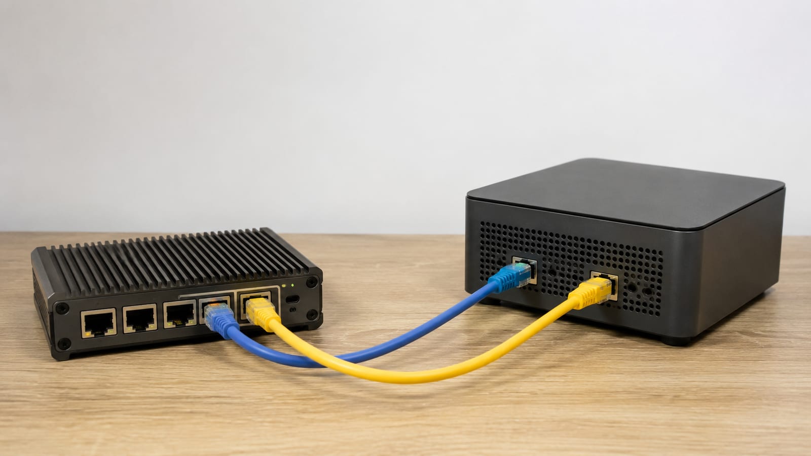 Monitor VPN Connections with eBPF, two network devices linked by blue and yellow Ethernet cables